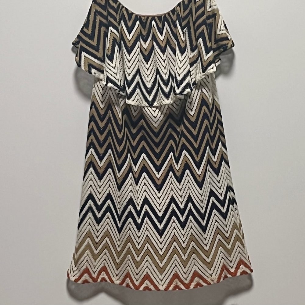 Judith March chevron elasticized Strapless ruffle off-the-shoulder mini dress.